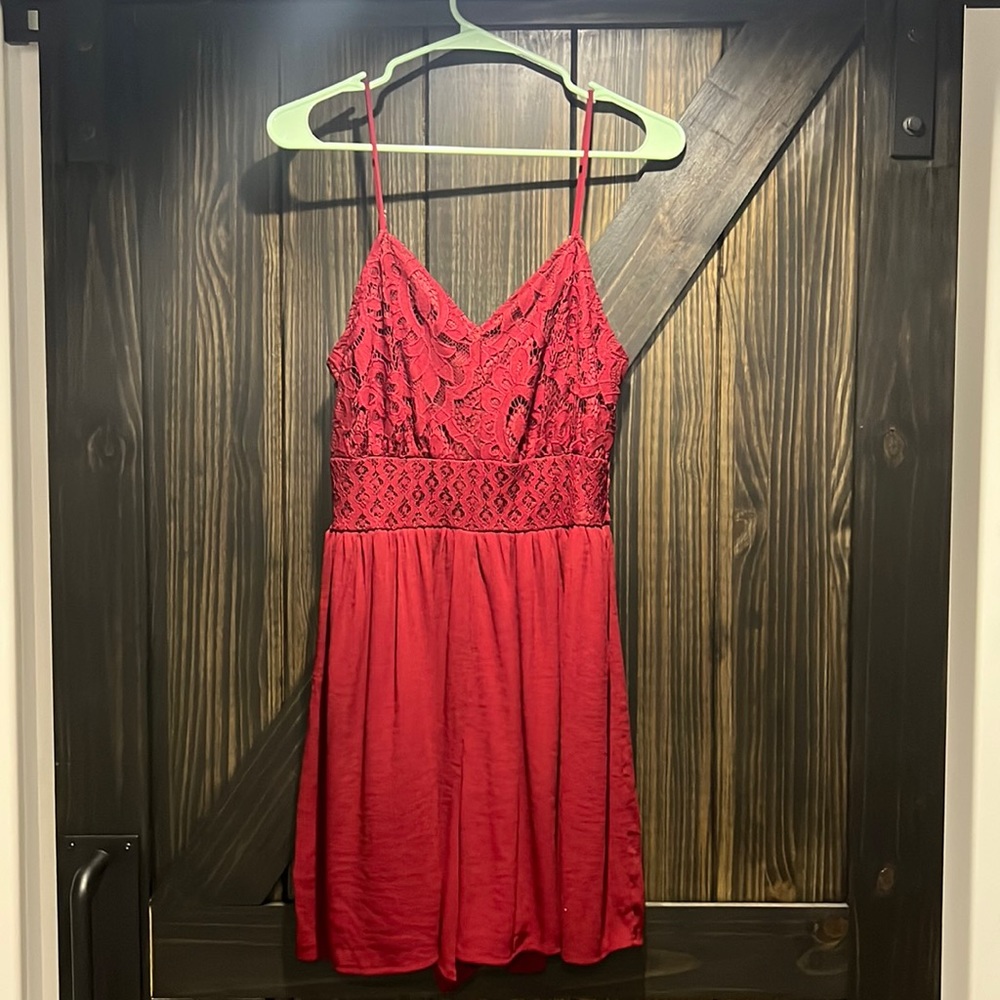 Dark red romper with lace detail by Maurices